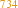 734